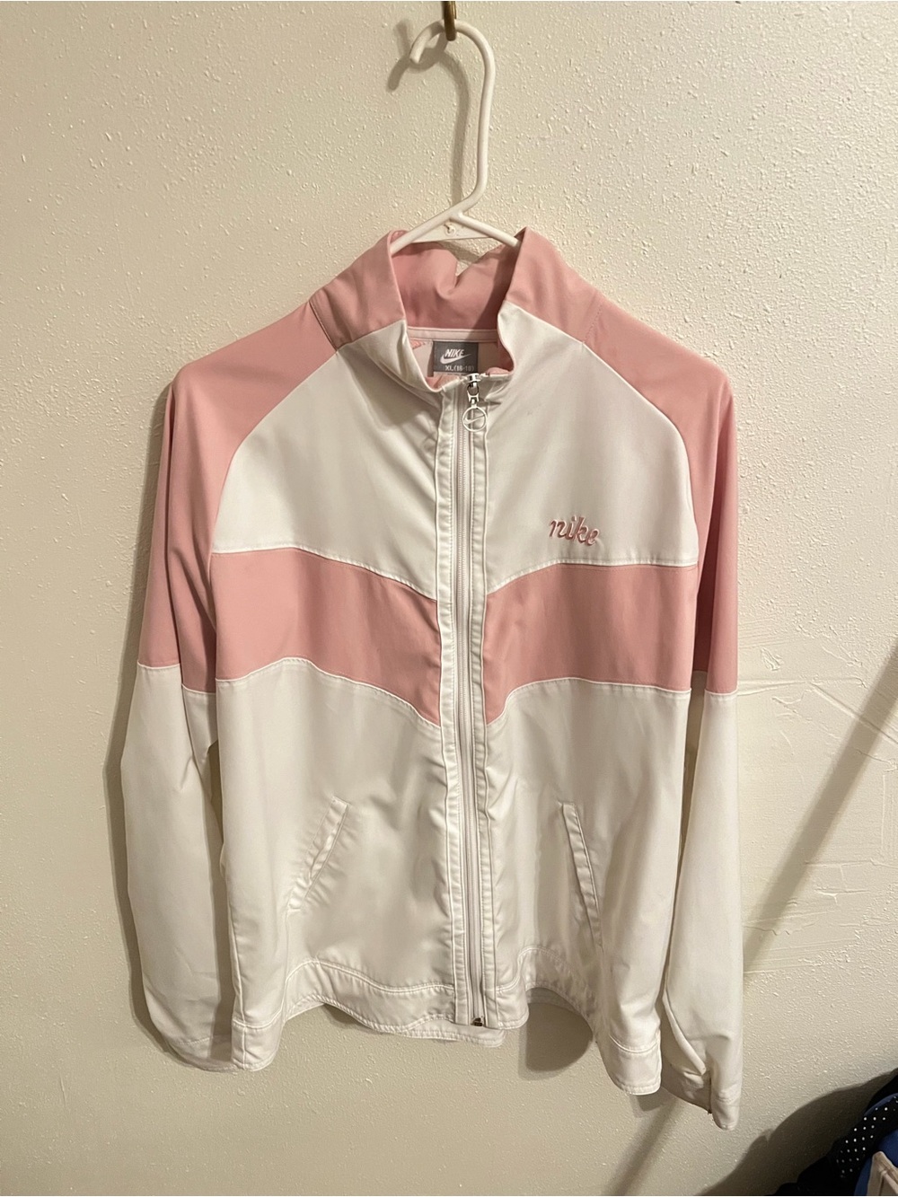 Women’s white and pink jacket